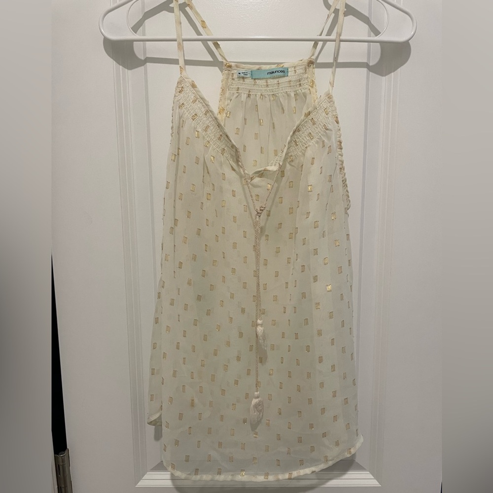 White and gold tank